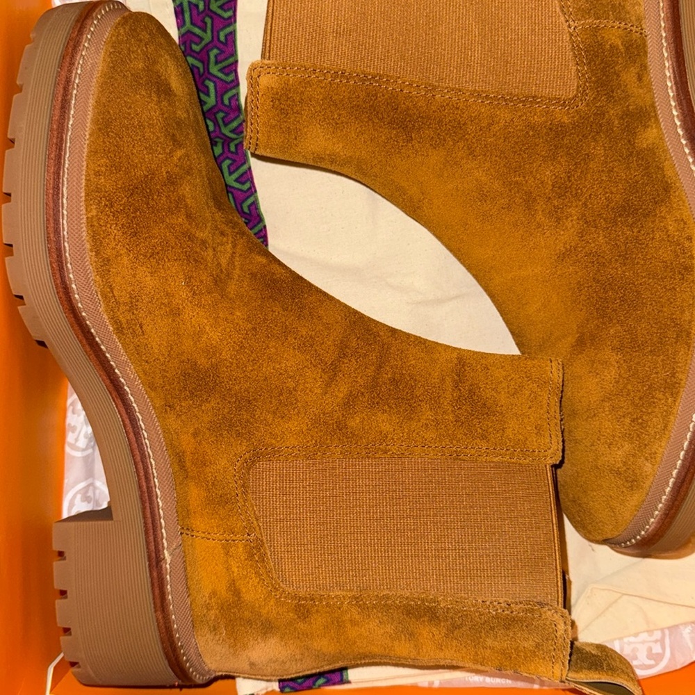 Tory Burch Chelsea 50mm Lug Bootie size 10. 
Never worn, original box and bag.